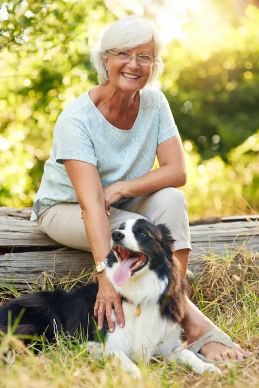 perfect-companion-retirement-portrait-happy-senior-woman-relaxing-park-with-her-dog